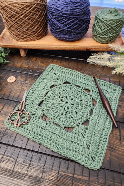 Stable Square crochet pattern – a 9-inch textured square with V-stitches, back loop only, and front post double crochet. Styled with a wooden crochet hook and scissors