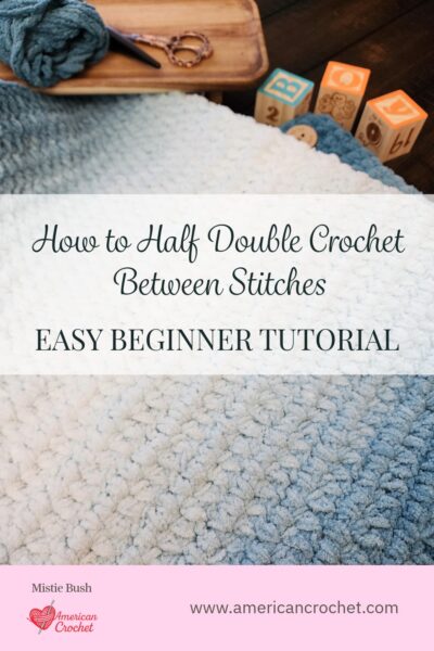 Pinterest image for How to Half Double Crochet Between Stitches — Easy Beginner Tutorial by Mistie Bush of American Crochet, featuring the Flutterby Baby Blanket in ombre blue tones with baby blocks and a close-up of the stitch texture.