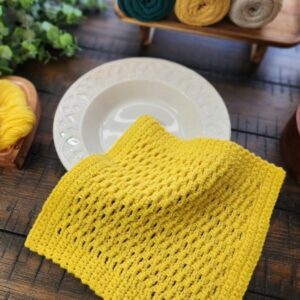 Double Moss Dishcloth crochet pattern in golden-yellow cotton — American Crochet